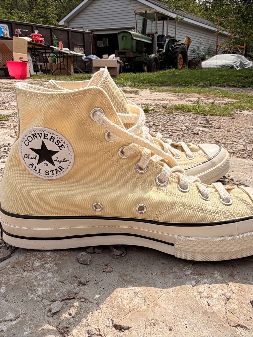 Converse Chuck Taylor High Top Sneakers in Pale Yellow Canvas